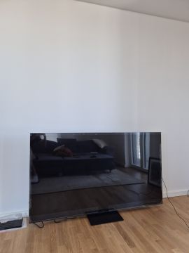 Techniker für Fernseher Wandmontage