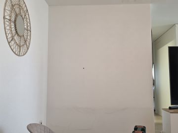 Techniker für Fernseher Wandmontage