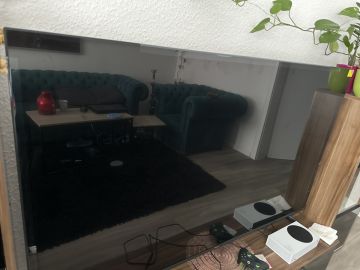 Techniker für Fernseher Wandmontage