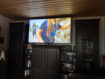 Techniker für Fernseher Wandmontage