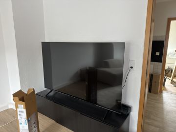 Techniker für Fernseher Wandmontage