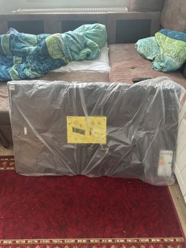 Techniker für Fernseher Wandmontage