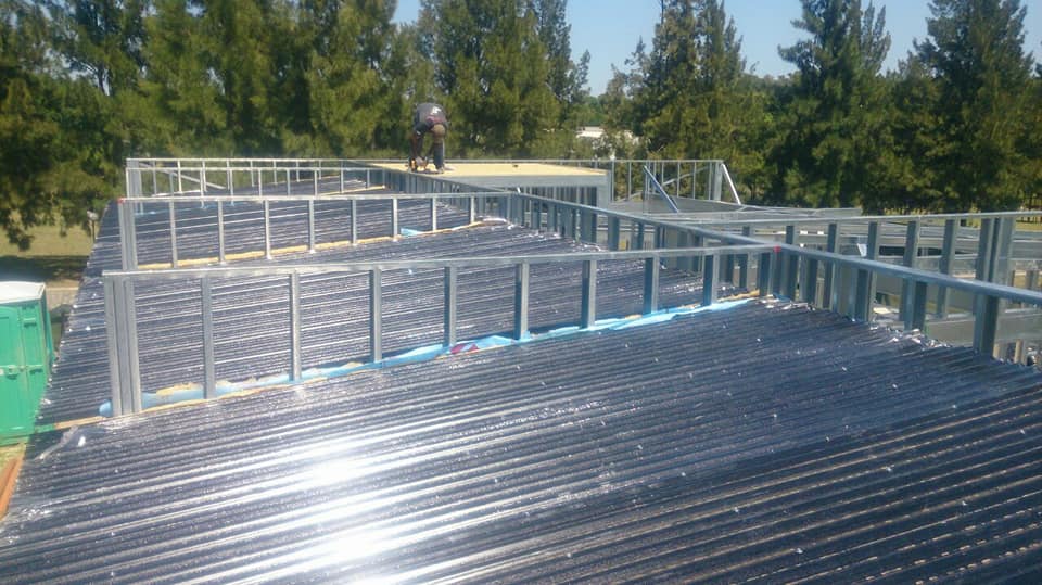 NEW YORK BUILDER STEEL FRAME, S.L - Huelva - Instalación de portadas