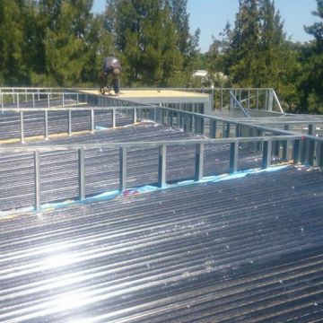 NEW YORK BUILDER STEEL FRAME, S.L - Huelva - Instalación de portadas