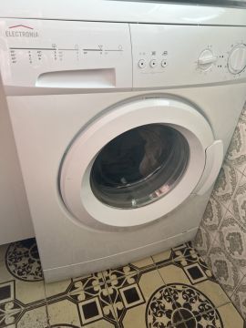 Reparador de Máquinas de Lavar Roupa
