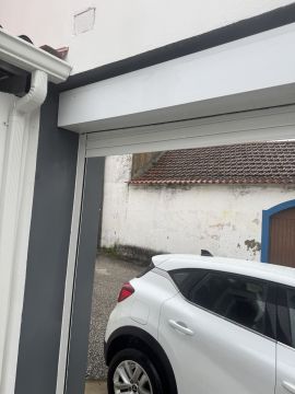 Especialista en reparación de puertas de garaje