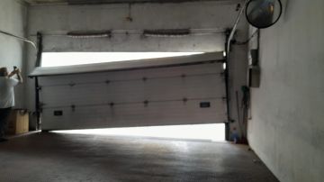 Técnico de Reparação de Portões de Garagem