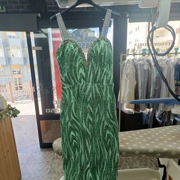 Passaki - Odivelas - Lavagem de Roupa e Engomadoria