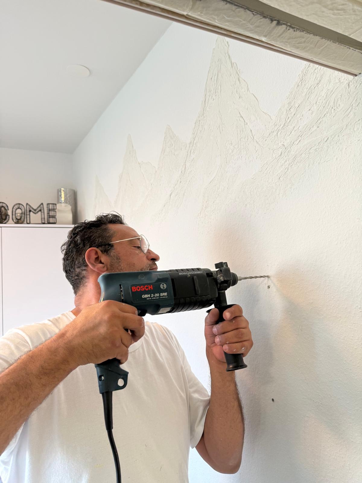 Eneider Souza - Figueira da Foz - Trockenbau reparieren und Oberflächenstruktur geben