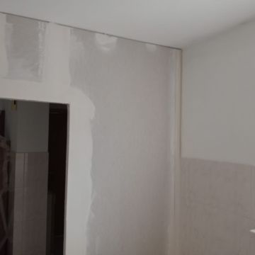 ICLR CONSTRUCOES E REMODELAÇÕES - Setúbal - Trockenbau reparieren und Oberflächenstruktur geben